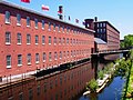 Image 38Textile mills such as the Boott Mills in Lowell made Massachusetts a leader in the US Industrial Revolution. (from History of Massachusetts)