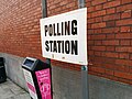 A sign with directions to a polling station, Holborn & St Pancras constituency. At the side of Highgate Library.