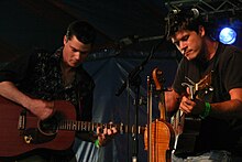Sean Lakeman (left) performing with his brother Seth in August 2005