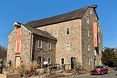 Gristmill, with plaster mill on the left, both with Hunterdon Art Museum banners