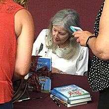 Berg at a book signing