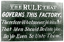 "Golden Rule Sign" that hung above the door of the employee's entrance to the Acme Sucker Rod Factory in Toledo, Ohio, 1913. The business was owned by Toledo Mayor Samuel M. Jones.