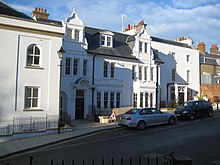 A large white terraced building