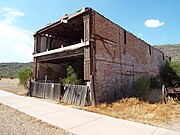 What remains of the Phoenix Bakery building. The structure was built in 1881 and was originally located at 7 West Washington Street. The building was donated to the Pioneer Living History Museum in Phoenix. In 2019, the bakery was moved and reassembled at the Phoenix Zoo. [16]