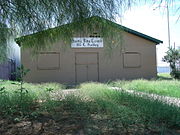 This historic building is the Santa Rita Center (also known as Santa Rita Hall). It is located at 1017 E. Hadley Street between 10th Street and 10th Place. It was here where Arizona native Cesar Chavez, the hero of farm workers, began his 24-day hunger strike on May 11, 1972, to draw attention to the inhumane conditions farm workers endured in the fields. Coretta King met with Chavez in the hall during his fast. For a while, the hall was the headquarters of what became the United Farm Workers of America Union. The structure, which was built in 1962, was listed in the Phoenix Historic Property Register in October 2007.