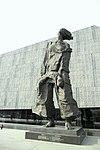 A statue titled "Family Ruined" in front of the Nanjing Massacre Memorial Hall