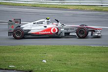 McLaren driver Jenson Button celebrating his victory in the Canadian Grand Prix
