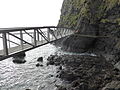 New bridge and old bridge remains at The Gobbins