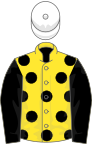 Yellow, black spots and sleeves, white cap