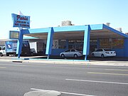 The Paris Laundry and Dry Cleaning Building was built in 1957. It is located 4130 N. 7h Avenue. This building was designed Googie style. Googie architecture is a form of modern architecture influenced by the Space Age and the Atomic Age. The building is considered historical by the Phoenix Historic Preservation Office.