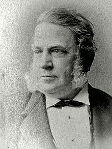 Victorian, middle-aged man with large, fluffy sideburns