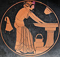 Kalē woman bathing at the laver, with a water bucket, a skyphos, and a wineskin, c. 500 BC