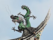 Roof decoration: four-fingers dragon (clay )