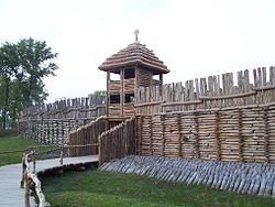 Bronze gate and wall of Biskupin archaeological site, a reconstructed Lusatian culture settlement from Bronze Age