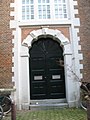 Entrance Zuiderkerk in Zanddwarsstraat (1607) by HdK