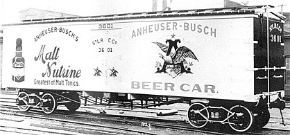 A pre-1911 "shorty" reefer bears an advertisement for Anheuser-Busch's Malt Nutrine tonic. The use of similar "billboard" advertising on freight cars was banned by the Interstate Commerce Commission in 1937, and thereafter cars so decorated could no longer be accepted for interchange between roads.
