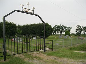 Camp Zion Church Cemetery is northwest of Spanish Camp on the north side of FM 1161.