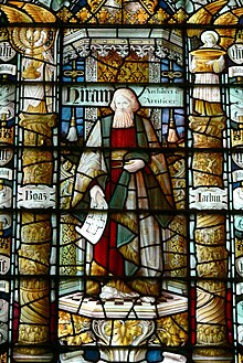 Color stained glass window of a biblical figure.
