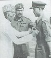 Major Mohammad Ahmed, grandson of Shaykh Altaf Hussain 18th in direct descent from Amir Kulal being awarded Military Cross by Quaid-e-Azam at DACCA (Former East Pakistan) 1948
