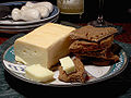 Image 12 Limburger cheese Photo credit: Jon Sullivan/Pharaoh Hound A plate of Limburger cheese and pumpernickel bread. Limburger originated from Limburg, Belgium, and is known for its strong odor, which is due in part to being fermented with the same bacteria partially responsible for human body odor. More selected pictures