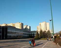 Városháza Square with typical concrete block of flats called Panelház