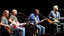 Four members of The Eagles performing