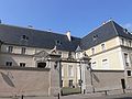 Hôtel des Loups cour, enclos, fontaine, portail, pilier, élévation, statue