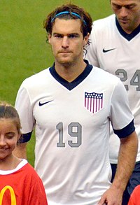 Photographie de face de Graham Zusi.