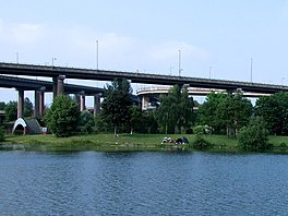 A lake with elevated roads above it