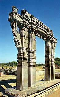 Kakatiya Kala Thoranam (Warangal Gate) built by the Kakatiya dynasty in ruins; one of the many temple complexes destroyed by the Delhi Sultanate.[68]