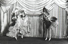 "The Giglet Sisters" posed on puppet theatre stage