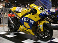 The Camel Yamaha YZR-M1, ridden by Valentino Rossi in the 2006 season on display. The Camel names and logo's have been changed with "Team" and a motorcycle.
