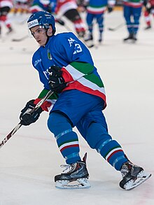 Photographie couleur d'un joueur de hockey sur glace