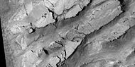 Mesas breaking up into blocks, as seen by HiRISE, under HiWish program.