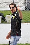 Bruno Senna wearing a black T-shirt with sponsors logos and jeans at the 2011 Canadian Grand Prix