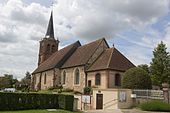 photographie dune église ; vue latérale de la nef et du clocher.