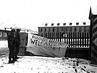 Former prisoners welcome the United States Army.