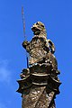 A lion representing the Morgan family is one of two heraldic beasts at Mapperton, sitting atop barley-twist columns on the gable end of the Tudor wing