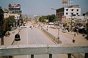 The Murree Road in Rawalpindi, as viewed from a footbridge while the construction work on Committee Chowk Underpass is being carried out in the background