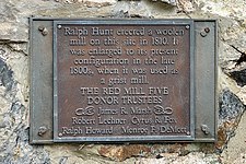 Historical information plaque by the Red Mill Five Donor Trustees