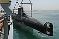 The rigging is the two frameworks, spreaders, wire ropes and related fittings used by the crane to pick up this submarine.
