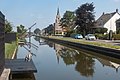 Berkel en Rodenrijs, canal along the Noordeindeseweg with church (Onze Lieve Vrouw Geboortekerk) in the background