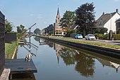 Canal along the Noordeindeseweg with church (Onze Lieve Vrouw Geboortekerk) in the background