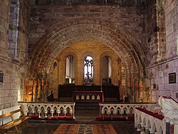 12th-century red sandstone chancel arch in Irish Romanesque style