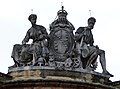 The municipal borough arms on the former National Provincial Bank (1869–70) at the junction of Bennetts Hill and Waterloo Street