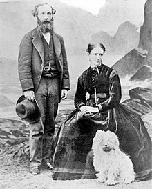 An image showing Katherine Clerk Maxwell (seated), with her husband James Clerk Maxwell and one of the couple's terriers.