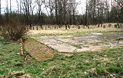 Foundations of the Husum-Schwesing sub-camp (with steles in the background)