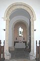 11th century tower arches and 12th or 13th century west window