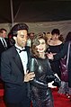 Image 27Actress Paula Abdul wearing semi-transparent black dress, curled hair and smoky eye makeup, 1990. (from 1990s in fashion)