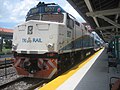 A EMD F40PH in Tri-Rail livery at the West Palm Beach station.